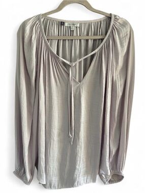 Jennifer Lopez lilac blouse